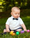 Infant baby boy playing with Easter eggs Royalty Free Stock Photo