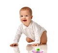 Infant baby boy toddler try to crawl happy smiling isolated Royalty Free Stock Photo