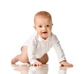 Infant baby boy toddler try to crawl happy smiling Royalty Free Stock Photo