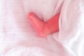infant baby feet sleeping in the bed