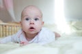 Infant baby girl in bed room