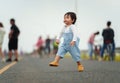 infant baby learning to walking first step on pathway Royalty Free Stock Photo