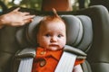 Infant baby sitting in safety car seat child security transportation Royalty Free Stock Photo