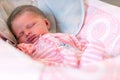 Infant Baby Sleeping Peacefully at Home in Bouncer