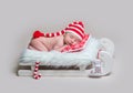 Infant baby sleeping on wooden crib Royalty Free Stock Photo