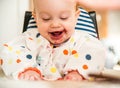 Baby boy eating blueberries Royalty Free Stock Photo