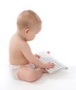 Infant child baby boy toddler typing computer keyboard Royalty Free Stock Photo