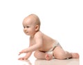 Infant child baby girl crawling and happy looking at the corner Royalty Free Stock Photo