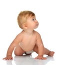 Infant child baby girl in diaper crawling happy looking at the c Royalty Free Stock Photo