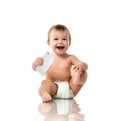 Infant child baby girl toddler playing with mobile cellphone happy smiling Royalty Free Stock Photo
