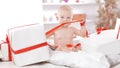 Infant child baby toddler kid sitting in presents gift for celebration Royalty Free Stock Photo