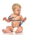 Infant child baby toddler sitting with medical stethoscope for p Royalty Free Stock Photo