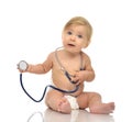 Infant child baby toddler sitting with medical stethoscope for p Royalty Free Stock Photo