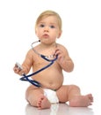 Infant child baby toddler sitting with medical stethoscope for p Royalty Free Stock Photo