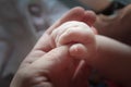 Infant child holding finger grip adult parent Royalty Free Stock Photo
