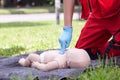 Infant CPR dummy first aid. Cardiac massage.