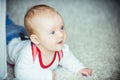 Infant crawl on floor carpet Royalty Free Stock Photo