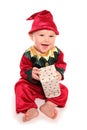 Infant dressed in elfs santas little helper fancy dress costume Royalty Free Stock Photo