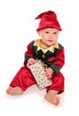 Infant dressed in elfs santas little helper fancy dress costume