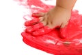 Infant hand painting red mosaic. Royalty Free Stock Photo