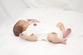 Infant laying on her back Royalty Free Stock Photo