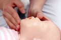 Infant mouth-to-mouth resuscitation Royalty Free Stock Photo
