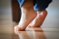 Infant's Precious Feet On Tippy Toes - Innocence Concept Royalty Free Stock Photo