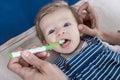 Infant teeth cleaning Royalty Free Stock Photo