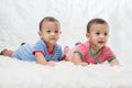 Infant twins sleeping.Newborn Babies Twins Sleep in Bed.Lovely sleep of the newborns babies on the bed. Royalty Free Stock Photo