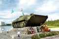 Infantry fighting vehicle, hoisted on pedestal on shore of Lake Komsomol - townspeople monument - combatants, local wars and armed