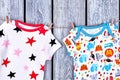 Infants apparel drying on rope. Royalty Free Stock Photo