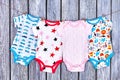 Infants clothes hanging on rope. Royalty Free Stock Photo