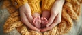 Infants Tiny Feet Cradled In Mothers Hands, Forming A Heart Shape