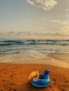 Infatable swimming toy on the beach Royalty Free Stock Photo
