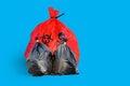 Infectious Wastes In Red Bag On White Background
