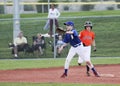 An Infielder Prepares to Force Out a Runner