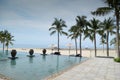 Infinite pool beach front resort Royalty Free Stock Photo