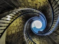 Infinite spiral with a balcony heading to the light Royalty Free Stock Photo