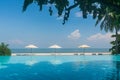 Infinite swimming pool next to the beach Royalty Free Stock Photo