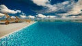 Infinite swimming pool with ocean Royalty Free Stock Photo