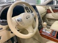 Infiniti FX 37 steering wheel and dashboard. Salon of a new stylish car, steering wheel.