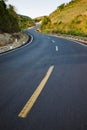 Infinity curved road with yellow line. Concept of adventure, travel, success... Royalty Free Stock Photo