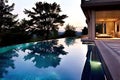 infinity edge pool a pool with one or more edges that overflow i Royalty Free Stock Photo