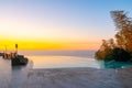 Infinity Edge Swimming Pool Water, Beautiful Black Sea View at sunset Royalty Free Stock Photo