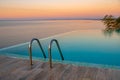 Infinity Edge Swimming Pool Water, Beautiful Black Sea View at sunset Royalty Free Stock Photo