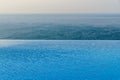 Infinity pool with crystal blue water view to sea ocean
