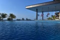 Infinity pool with swim up bar Royalty Free Stock Photo