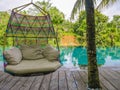 Infinity pool at tropical resort in Asia with view to the jungle in holidays travel and tourism concept Royalty Free Stock Photo