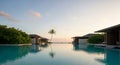 Infinity pool view at sunset, flanked Royalty Free Stock Photo