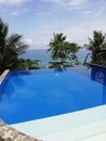 Infinity pool with view of tropical Chinese Sea on Mindoro, Philippines